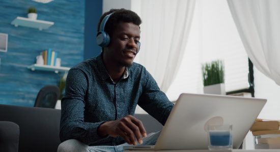 african-american-man-with-headphone-on-watching-movie-on-streaming-services.jpg
